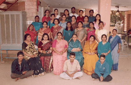Faculty group portrait on stage