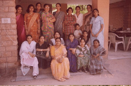 Faculty portrait in the courtyard