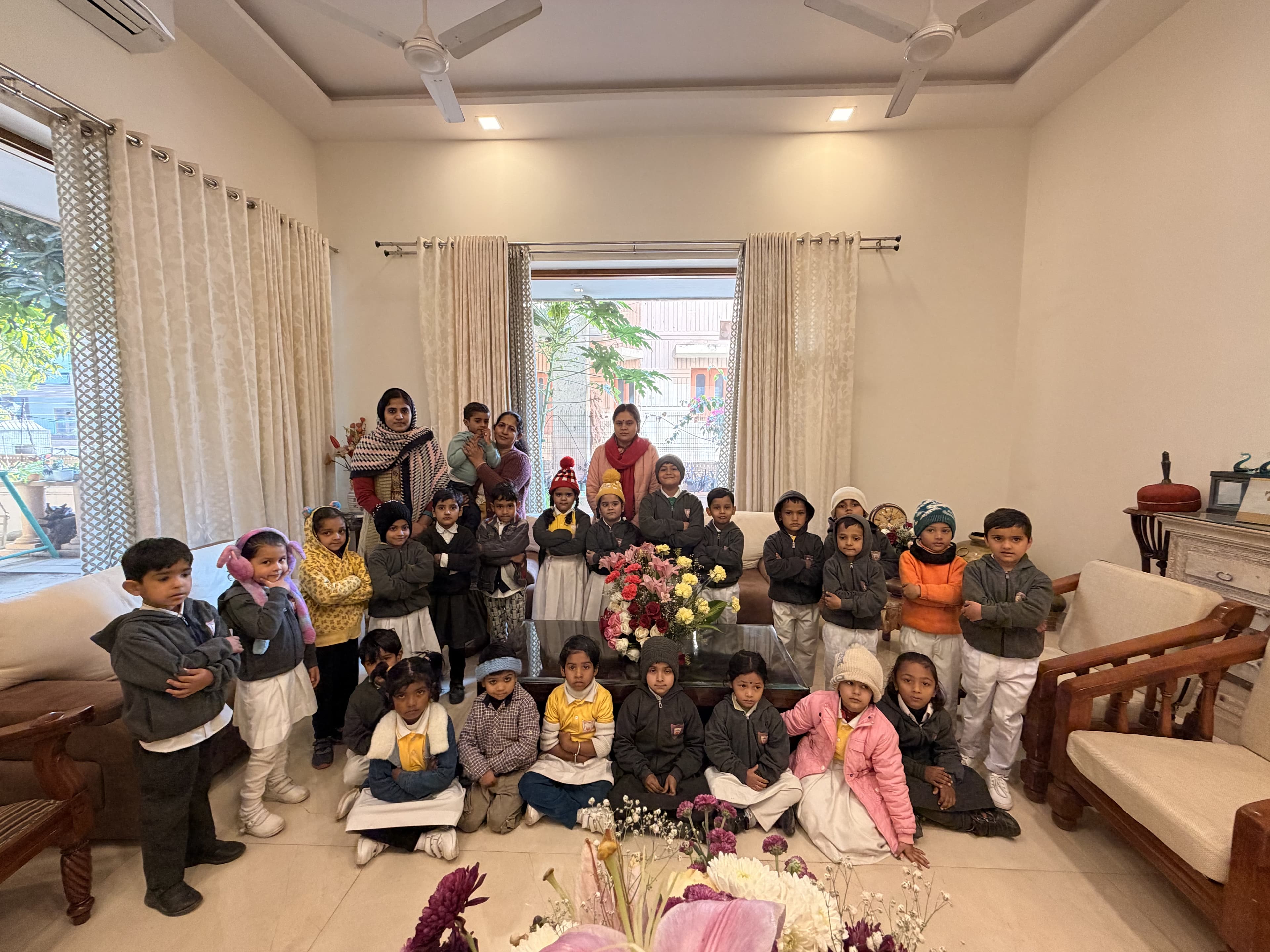 Pre-primary winter — LKG group with teachers