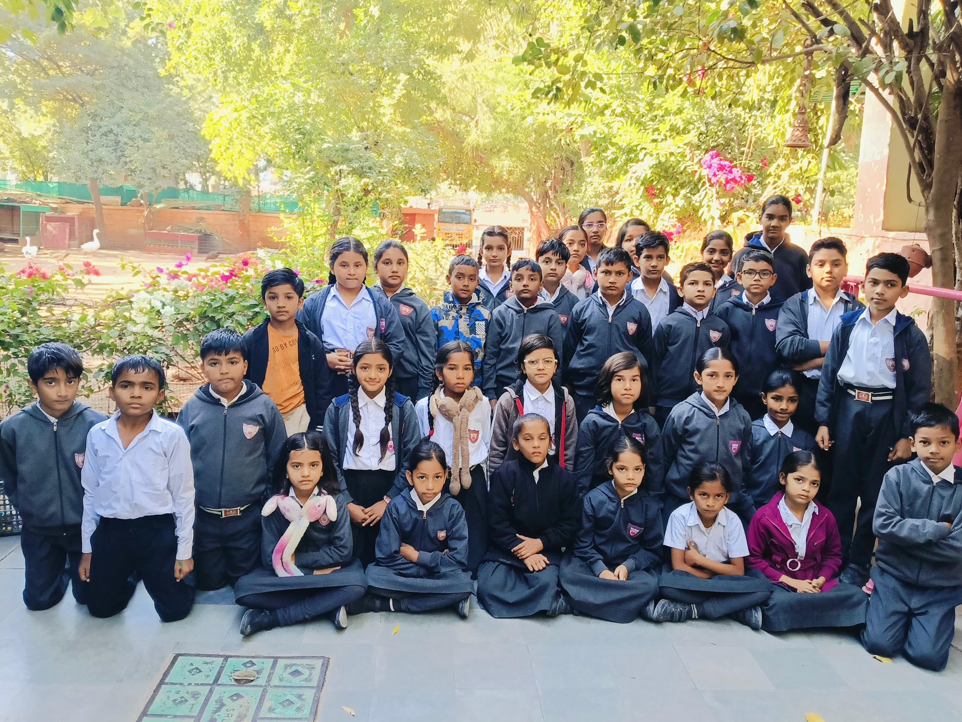 Primary — winter uniform group in the garden